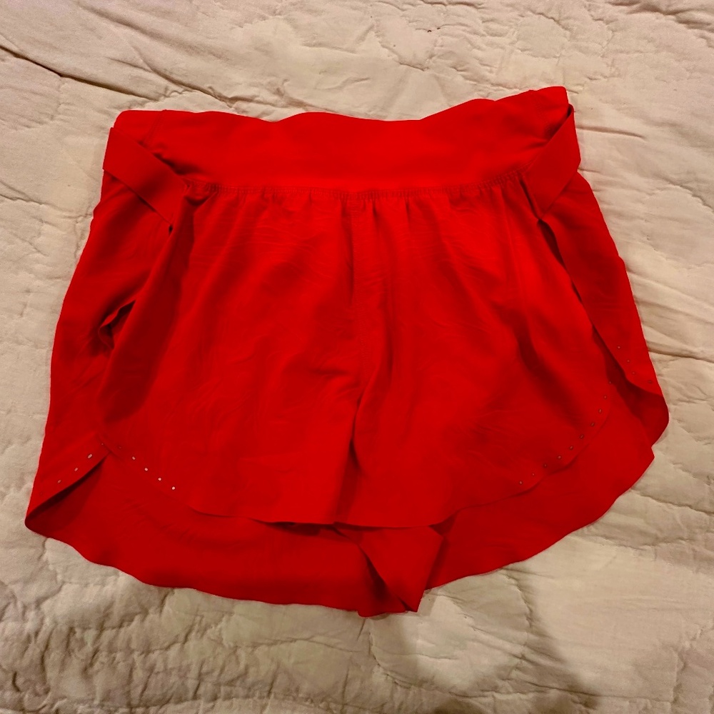 Lululemon orange running shorts